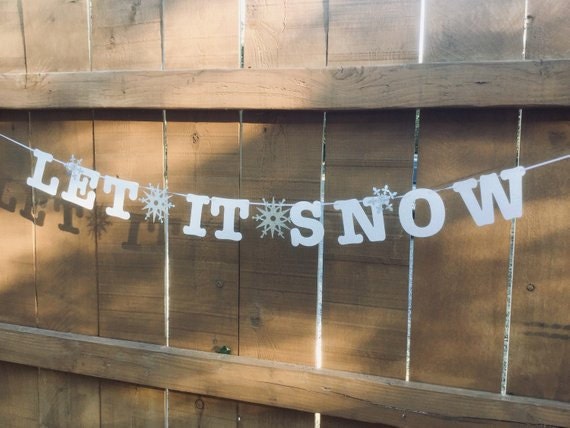 Let it Snow banner in white glitter with silver glitter snowflakes