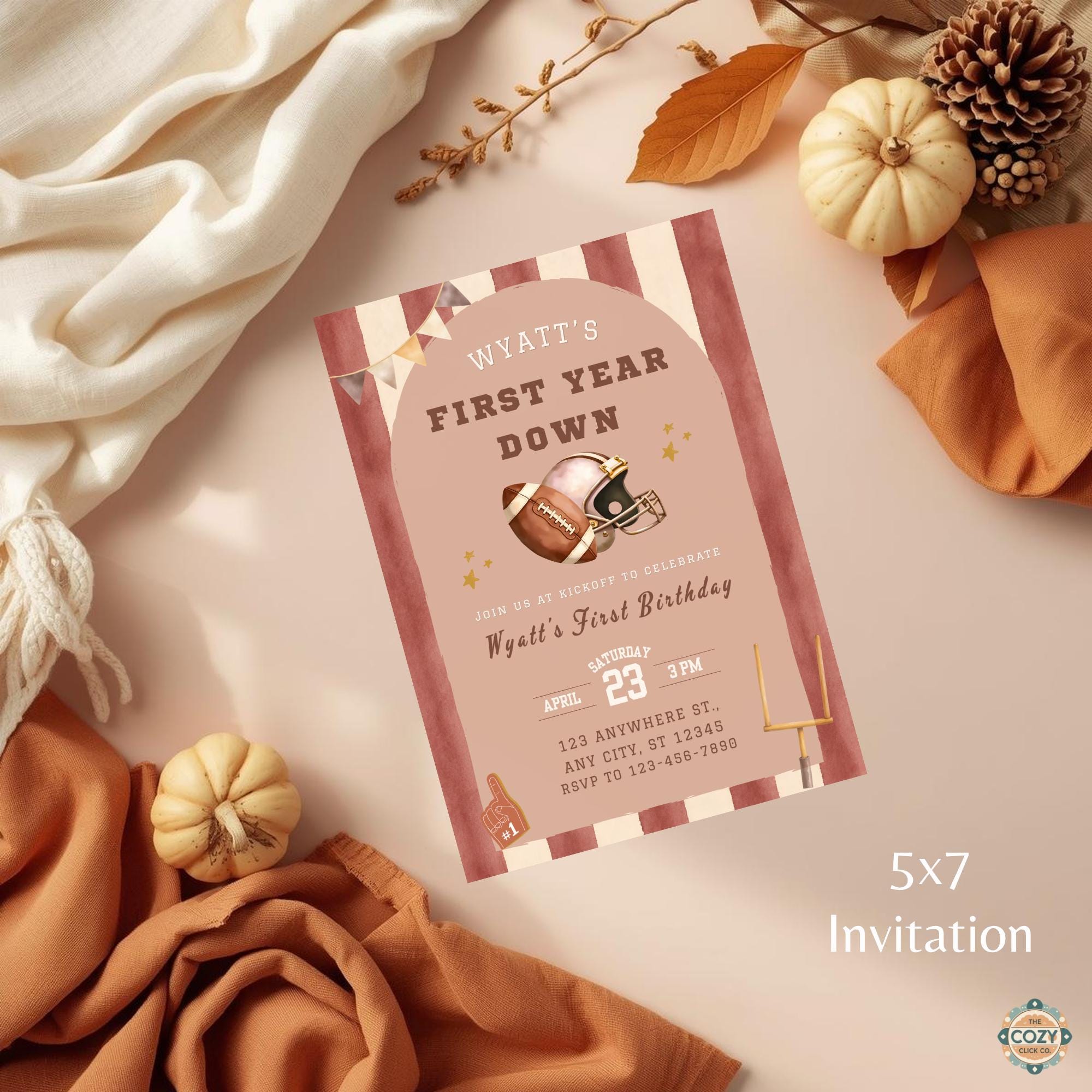 First Year Down football first birthday invitation mockup with vintage football details and warm neutral party colors.