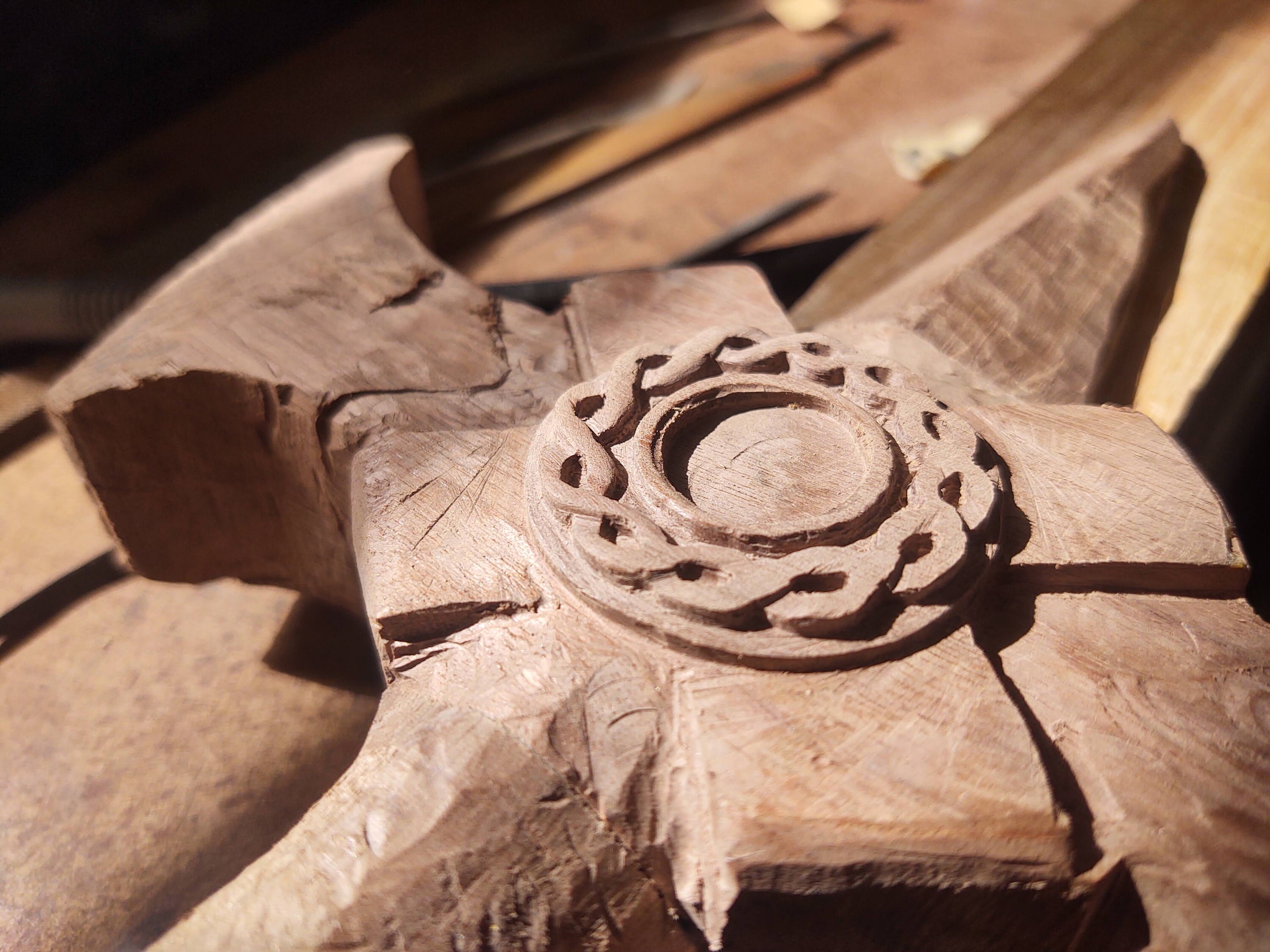 Perfecting the design. Carving the ropes to look as if they are intertwined is key to making this click.