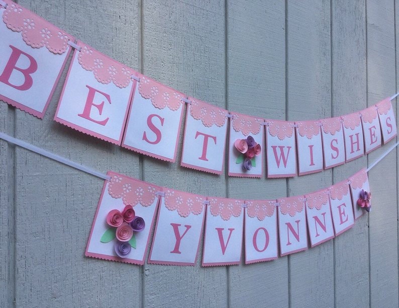 best wishes banner in pink with pink and purple rolled paper flower and lace