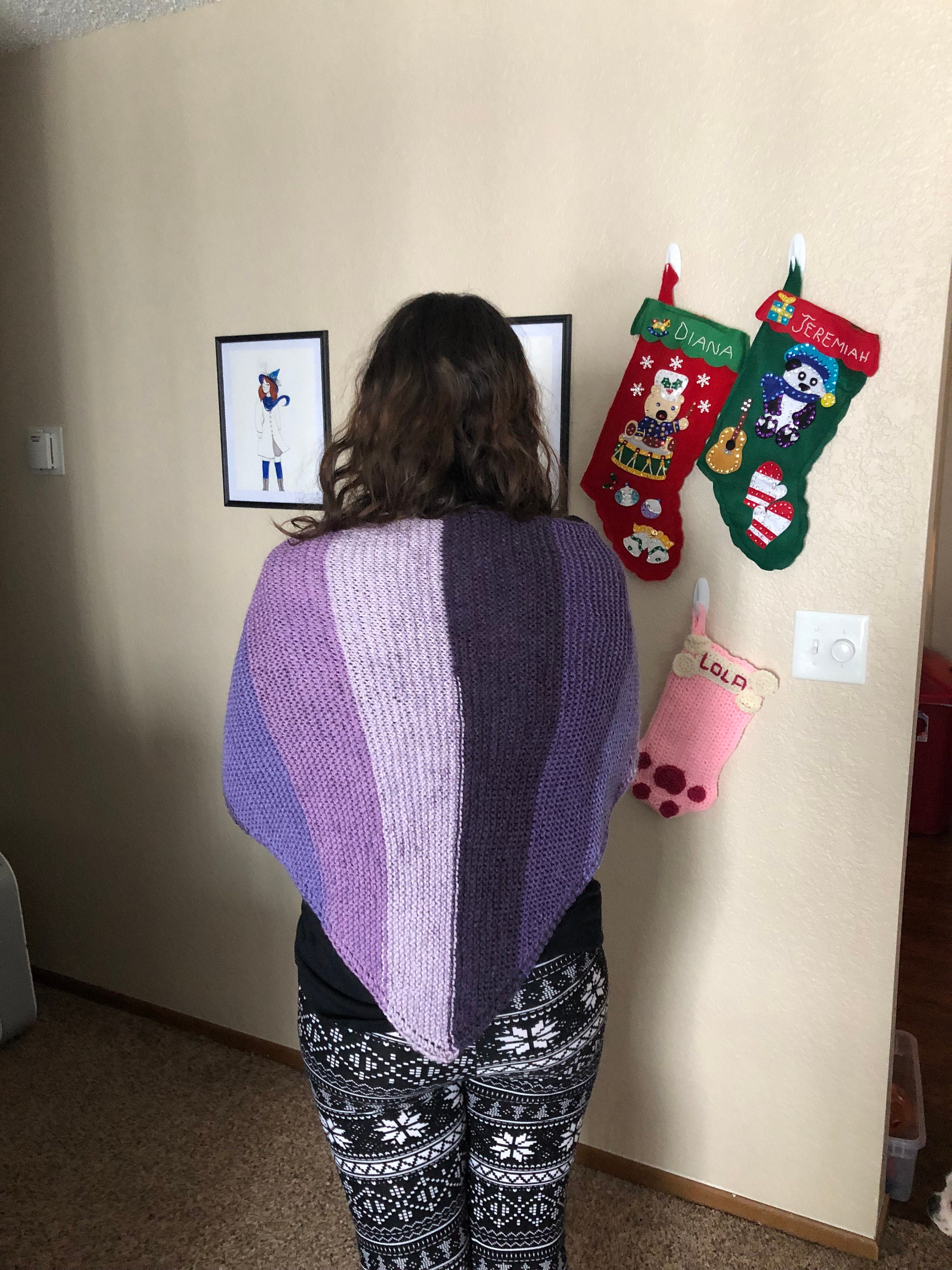 Woman wearing purple knit shawl