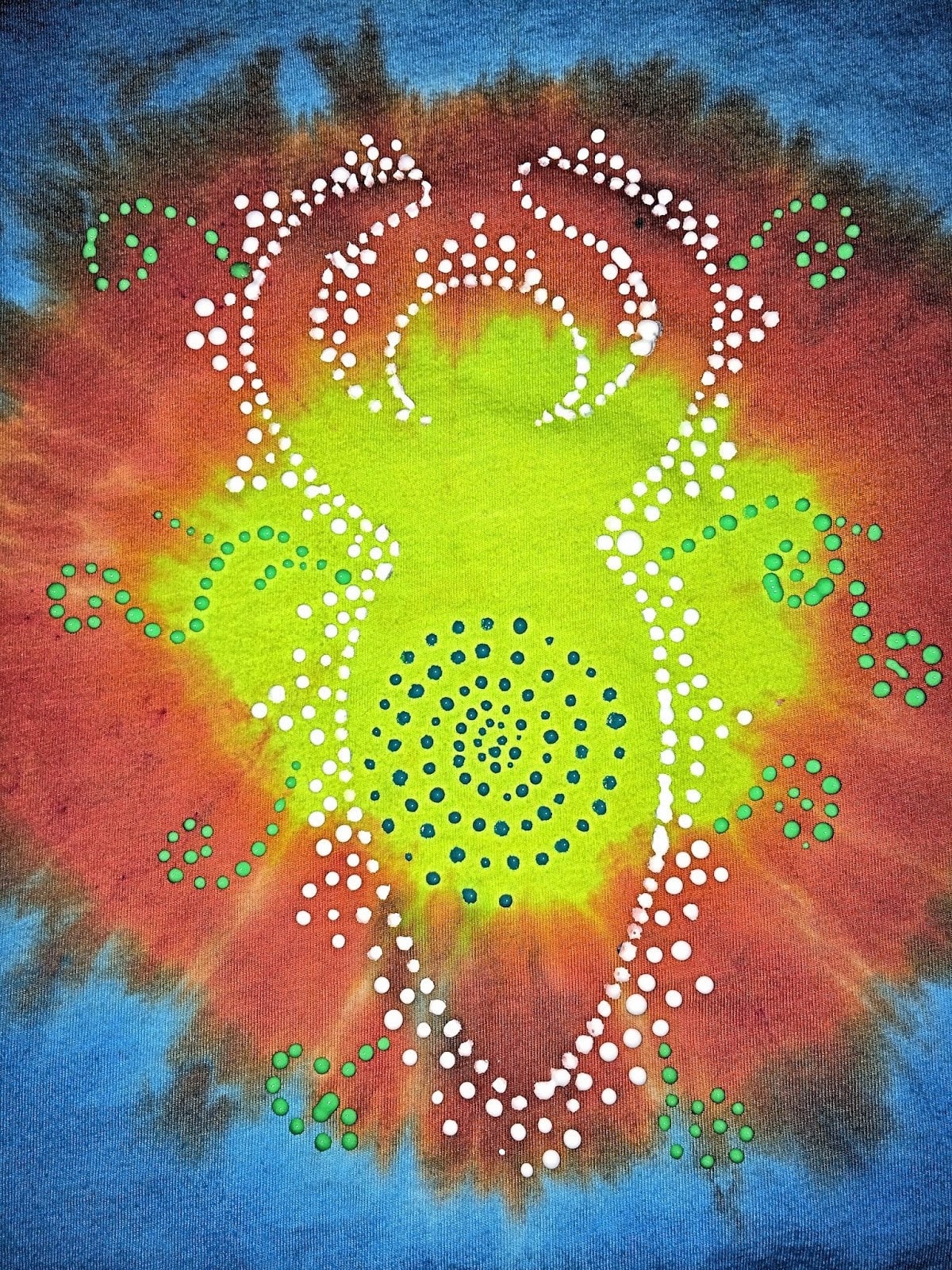 Blue puffy paint spiral dots added inside the goddess silhouette