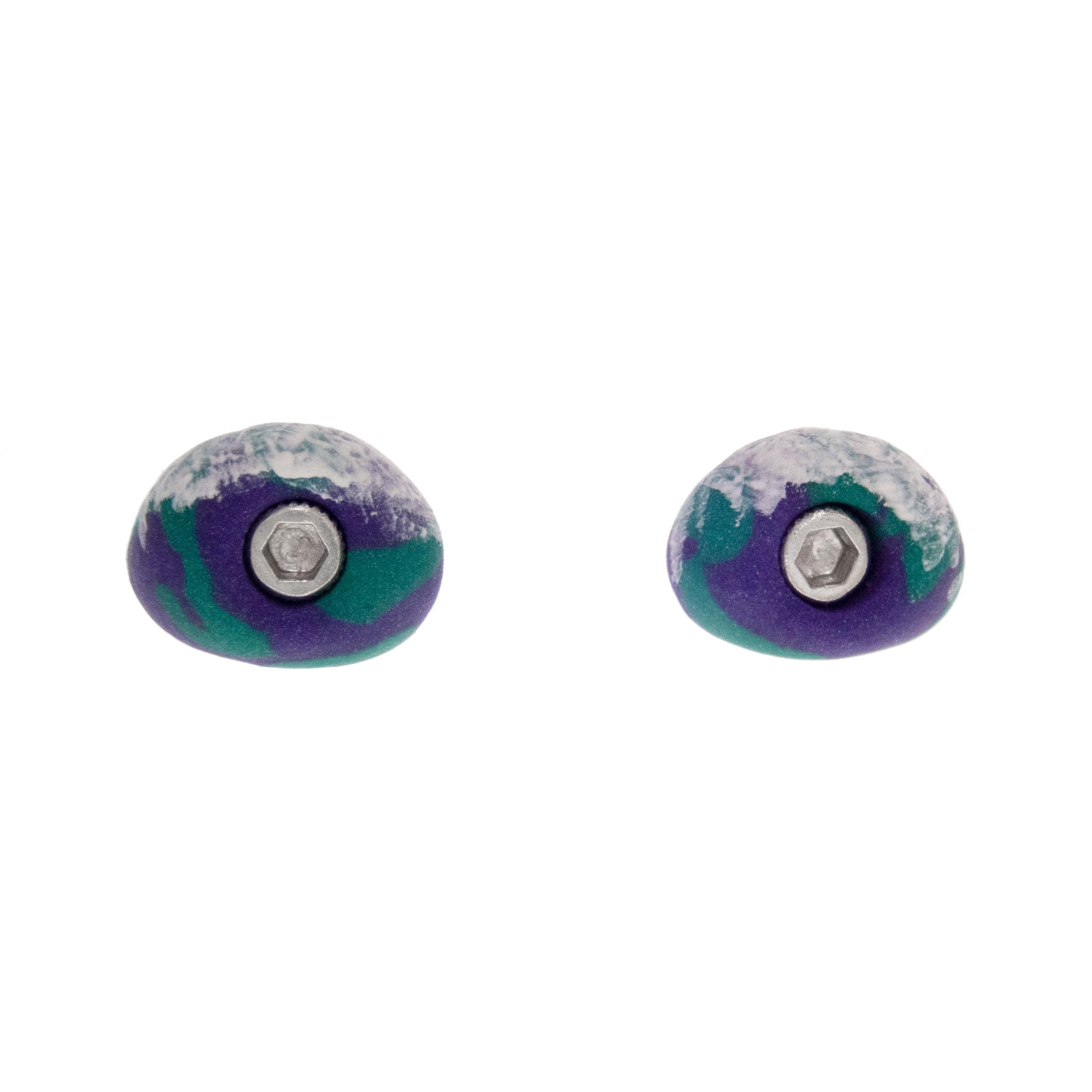 small bouldering jug earrings, crafted in clay texture to resemble real climbing gear with subtle modern detailing.