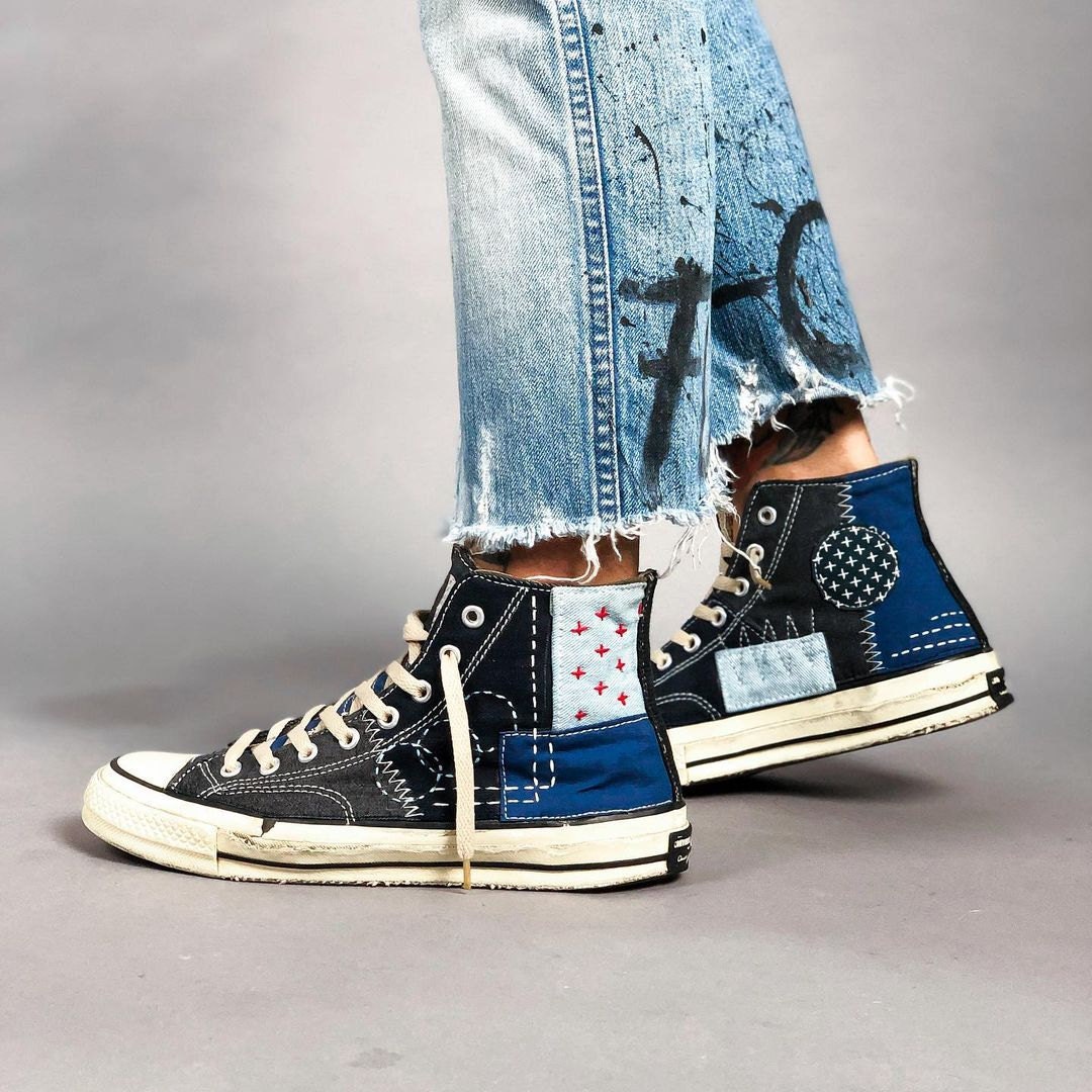 artsy used shoes with various patches using old denim fabric