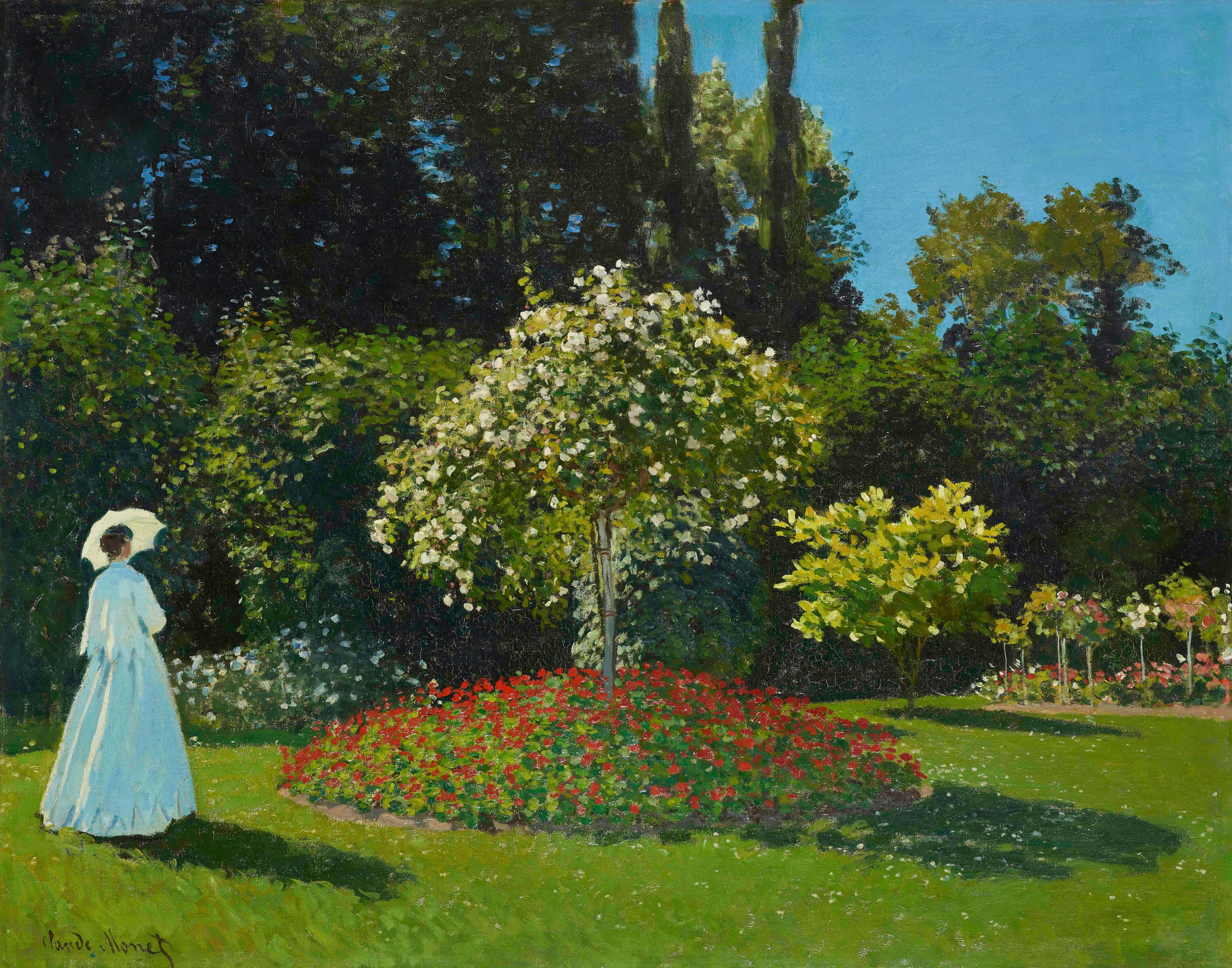 A painting of a woman in a white dress standing in a garden full of flowers and trees. She is holding a parasol and not looking at the viewer