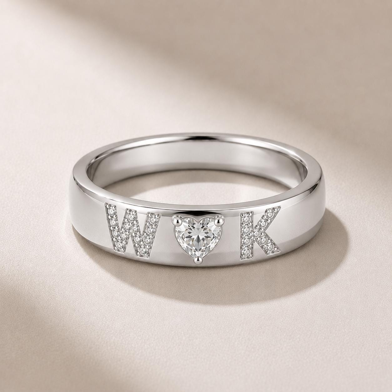 Personalized Couple Ring handcrafted in Solid Gold with any two custom initials from A to Z, sparkling lab grown diamond letters and a heart shaped center diamond. Romantic custom wedding band, anniversary gift, promise ring, matching couple jewelry, handmade fine jewelry, meaningful keepsake made just for you.