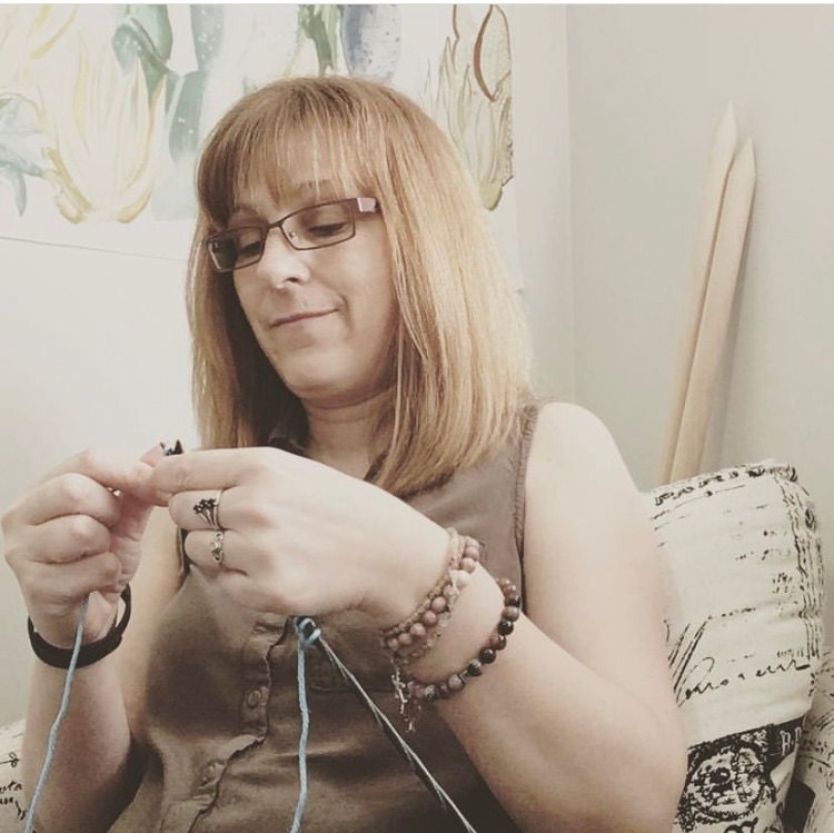 Me in my home studio happily knitting my days away