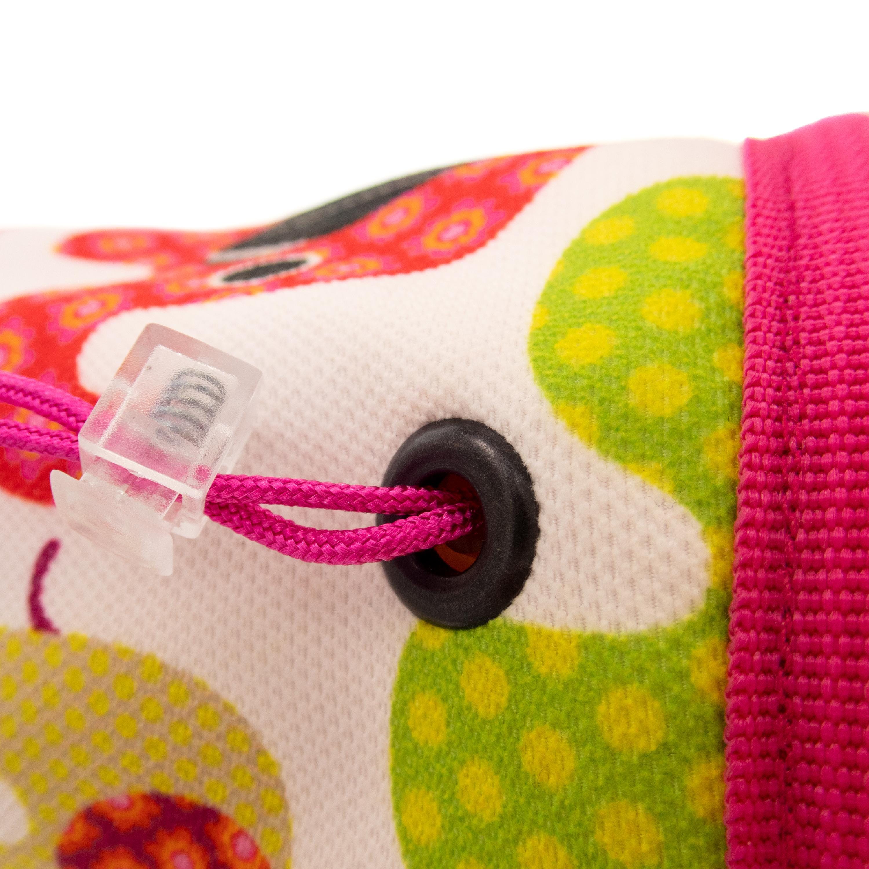 Close-up of the stopper buckle closure on a small kids’ climbing chalk bag