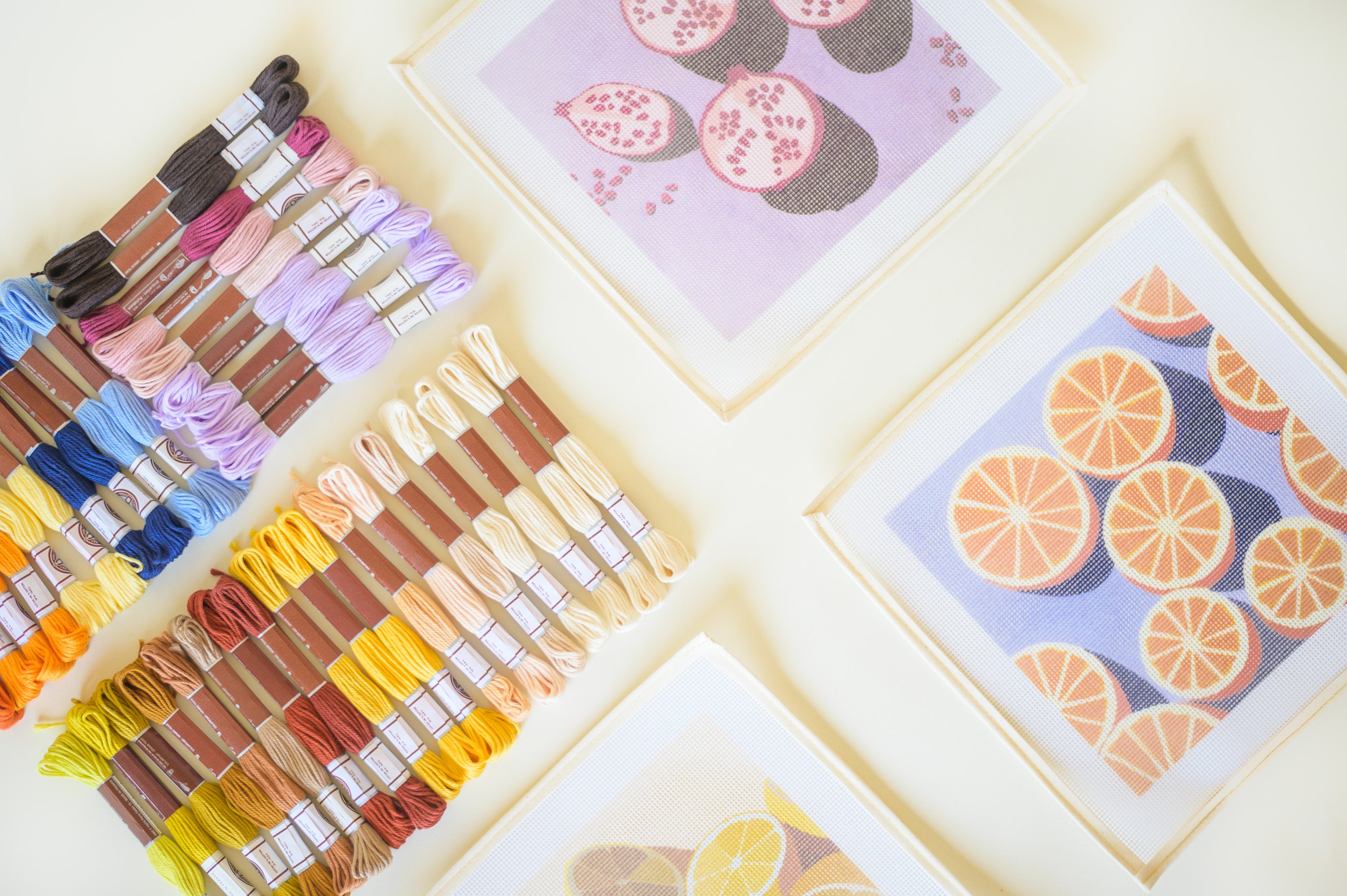 Pomegranates, Oranges and Lemons needlepoint kits from Unwind Studio designed by Laura Croft, Ana Popescu and Anca Putin with a colourful range of soft cotton threads.
