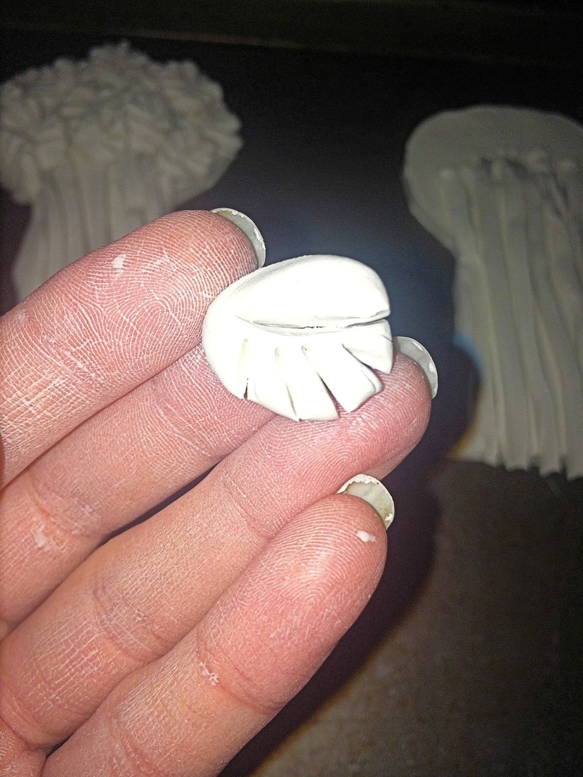 Small slits cut on each side of the center cut to form wheat grain texture