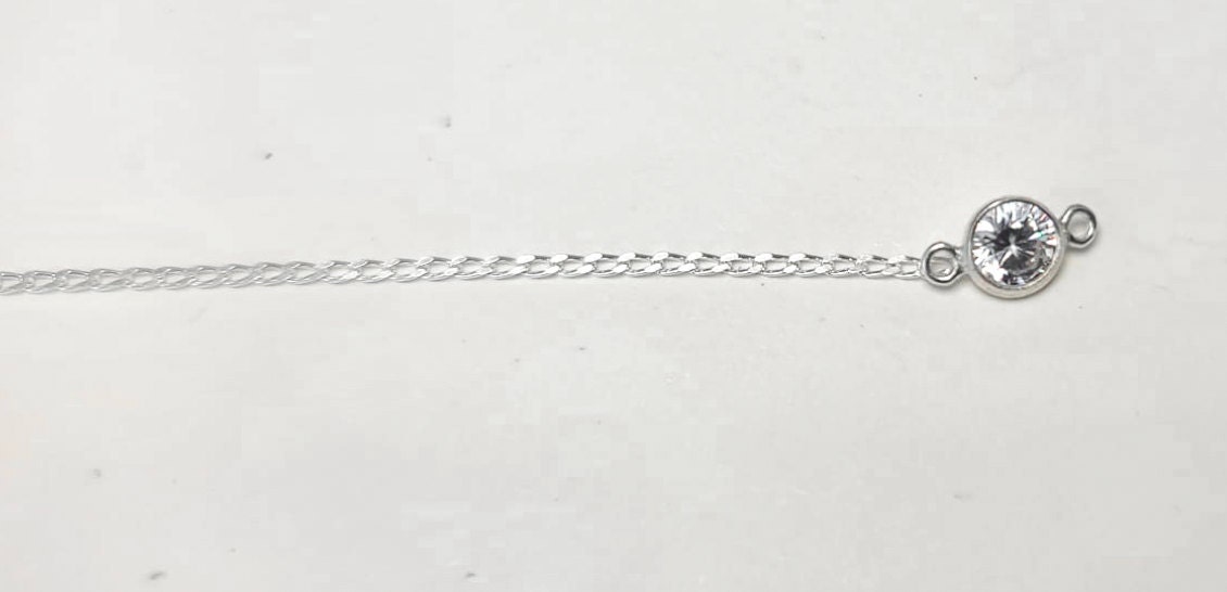 medium cz next to our thicker silver chain