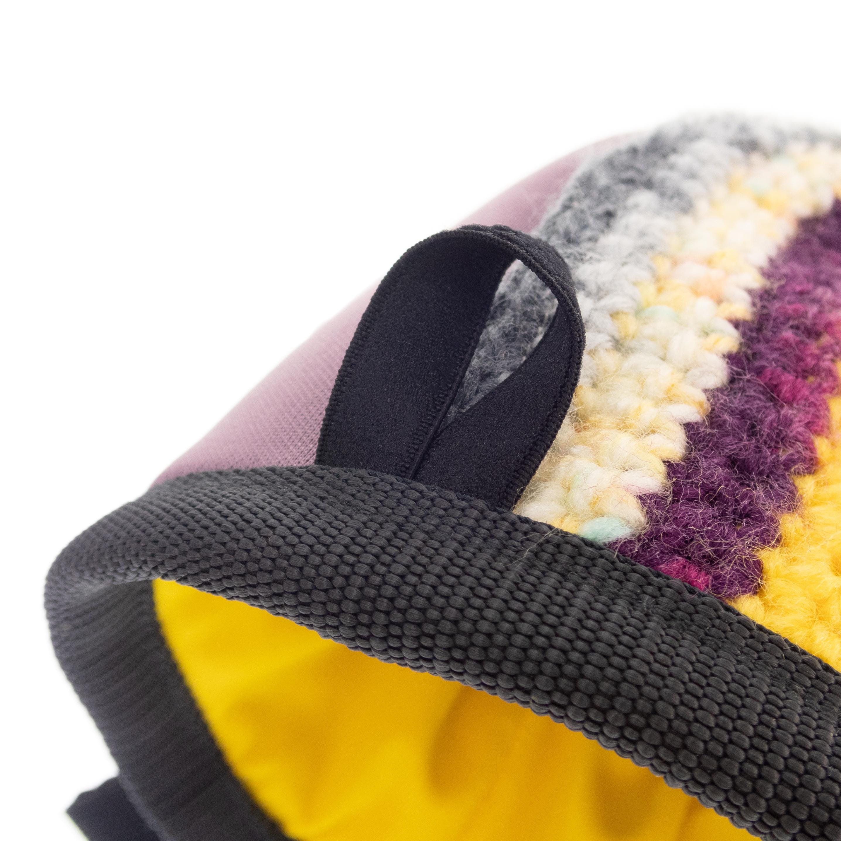 Hand knit chalk bag for kids by Nadamlada, handmade climbing chalk bag with colorful striped design for rock climbing and bouldering. Lightweight childrens climbing gear crafted for young climbers.