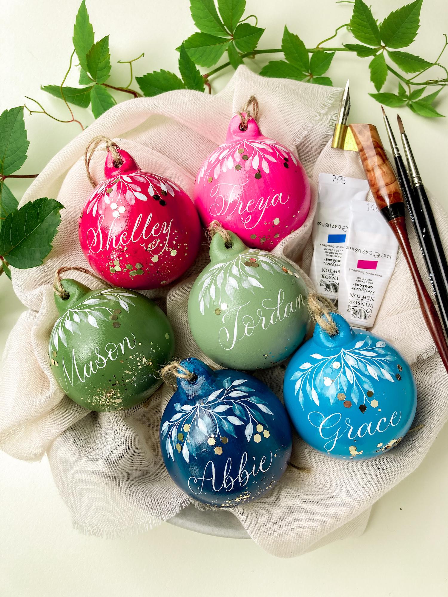 Colourful personalised Christmas baubles with calligraphy | By Moon & Tide UK
