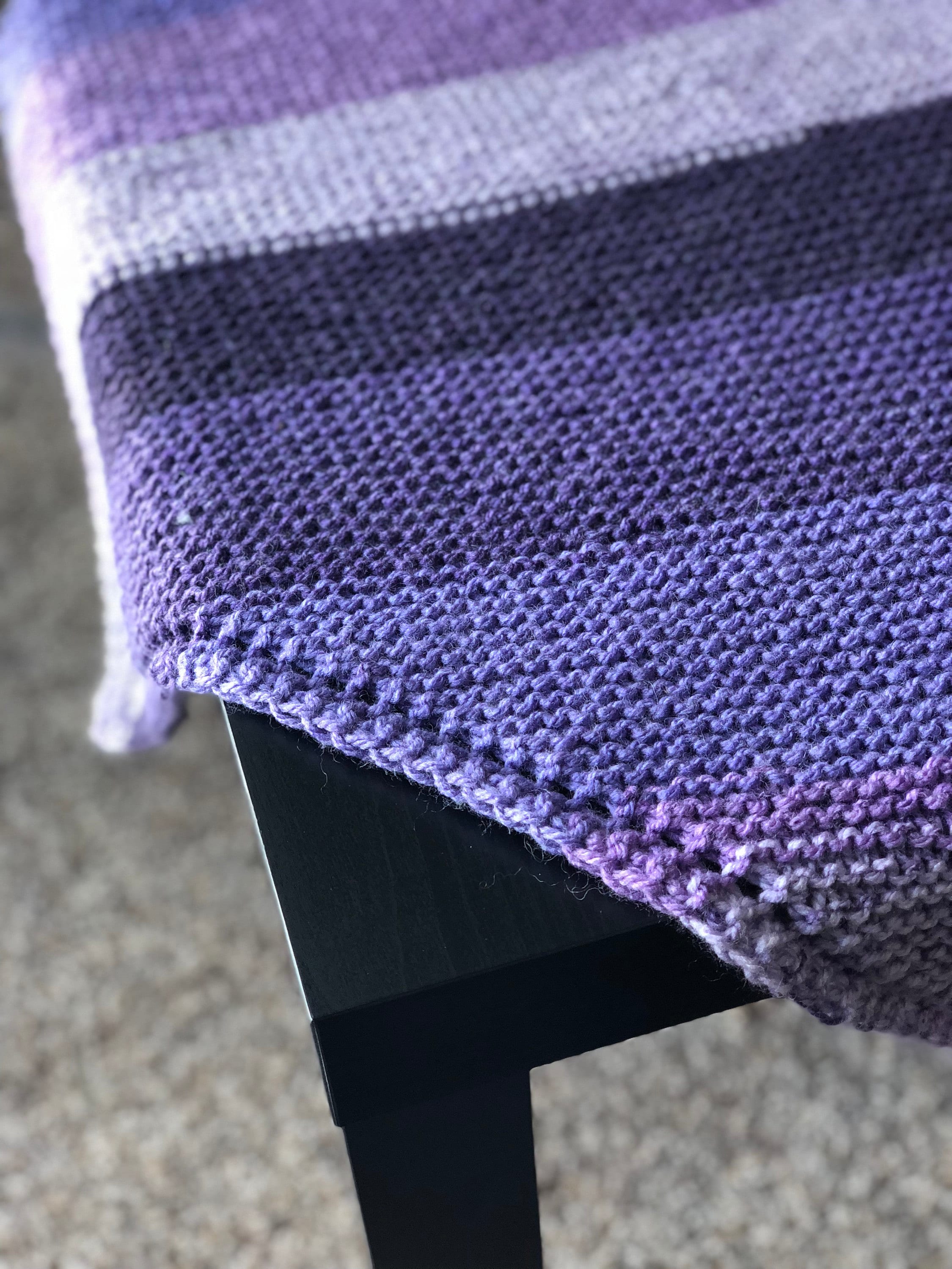 Purple shawl on a table