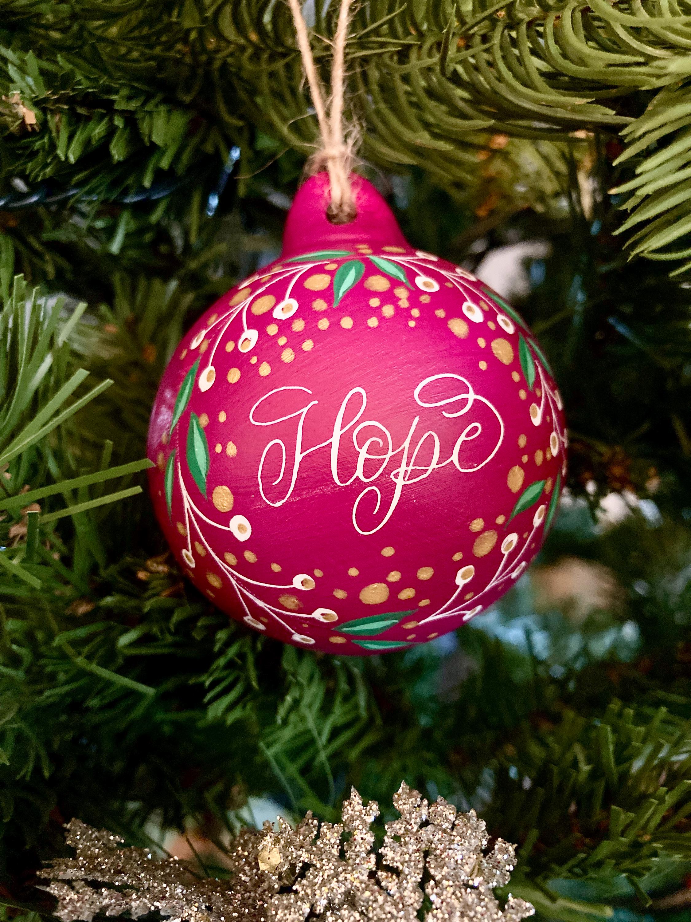 calligraphy bauble personalised with the name Hope in a quirky modern lettering style