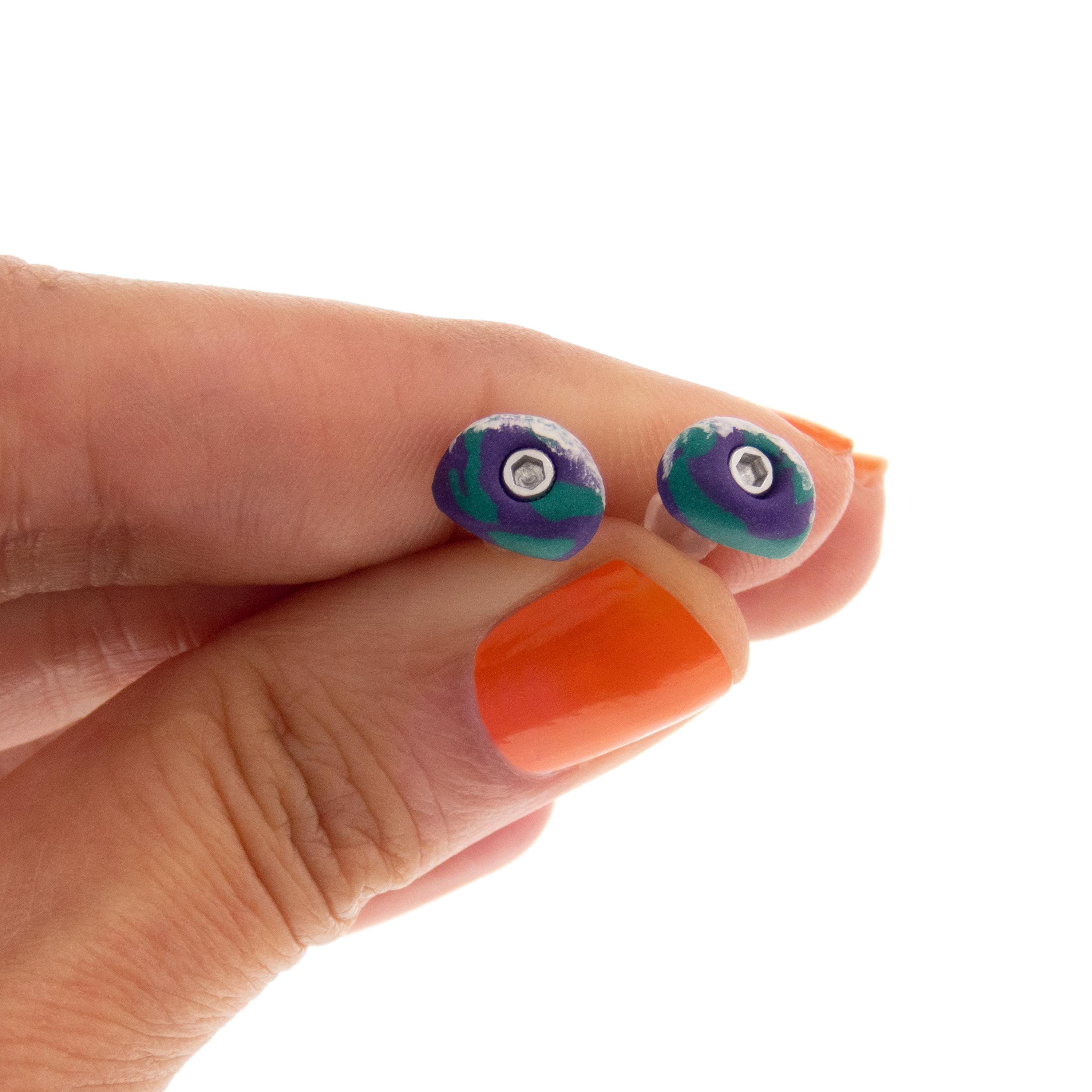 modern unisex earrings inspired by climbing holds, presented as a unique gift for bouldering enthusiasts