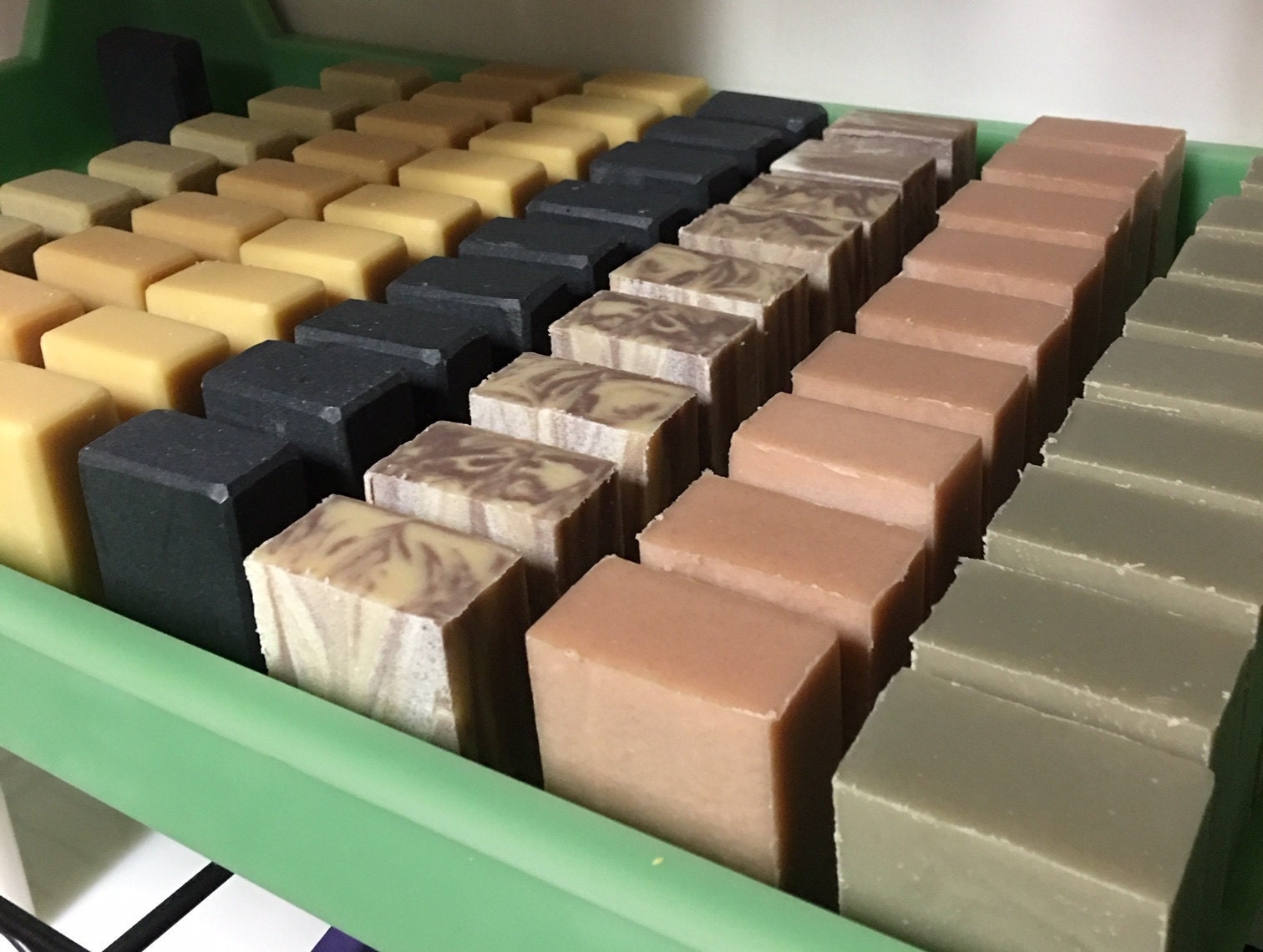 You can see the difference in this picture. The 4 rows of soap on the left were beveled.