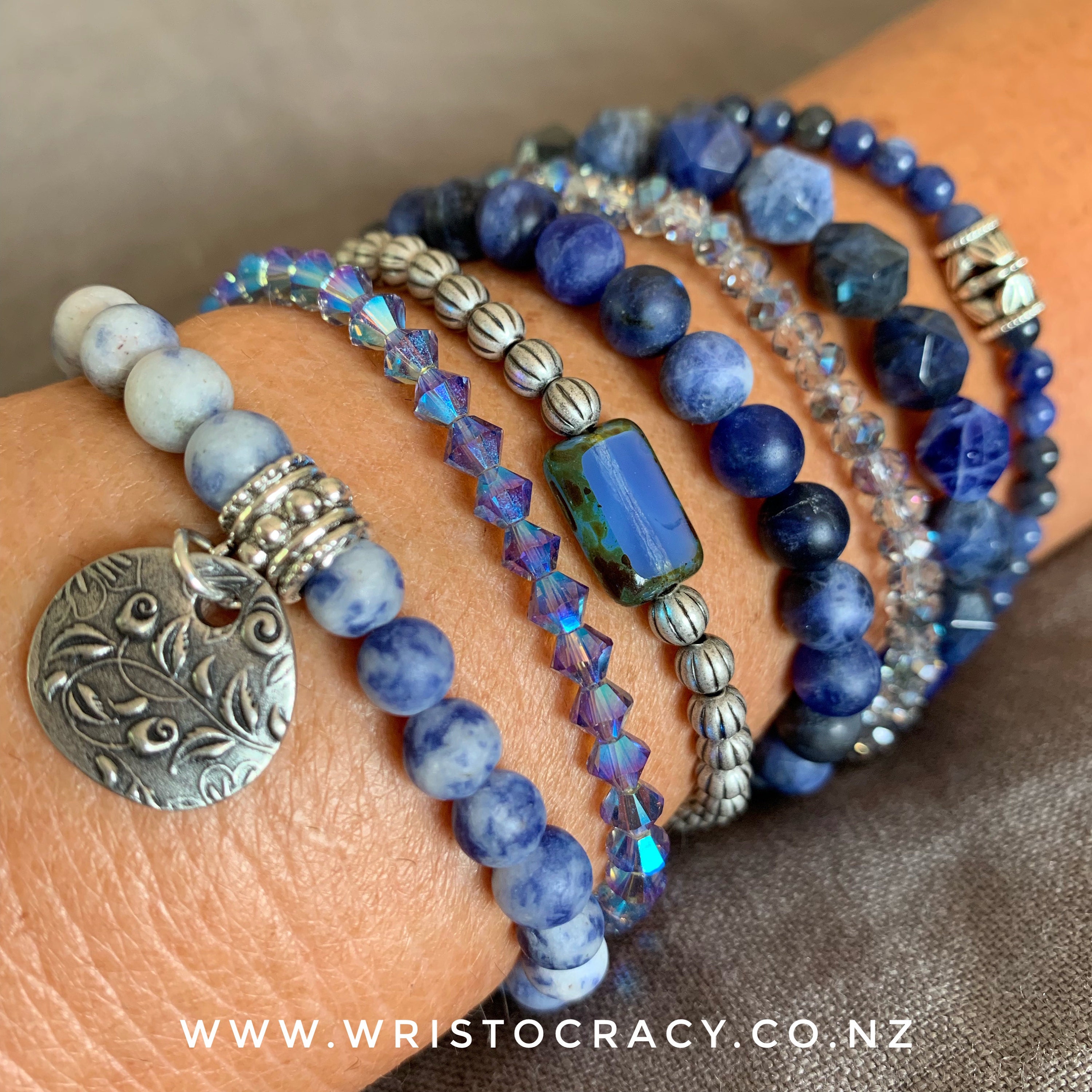 Happy Hump Day .... a beautiful explosion of Sodalite for you all to enjoy ... This gorgeous wrist is made up of a couple of Sodalite sets ... the Brazilian Sodalite at the front then a Swarovski Crystal single and fourth from the front I’ve included a little hint of another Sodalite that I’m bringing back very soon ....a matte round that is currently available only as a single (by request) .... I will add it to the website later today or just message me now if you want one - $30 finished with a silver round or if you prefer a charm (let me know) ... I will be setting this one up in a set soon however just couldn’t resist including this gorgeous picture today!! Have a great day!