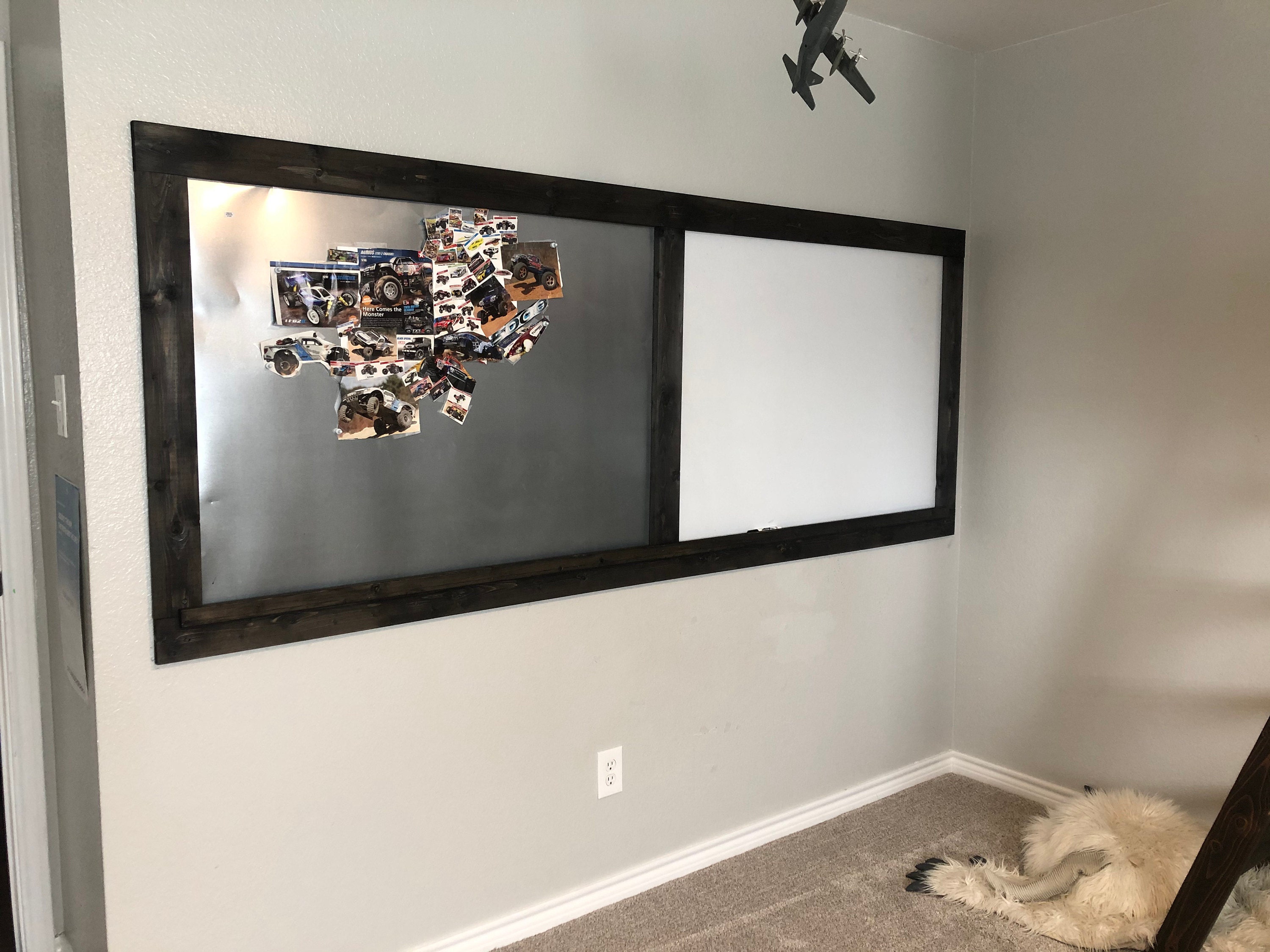 Magnetic side and a white board side for our sons room