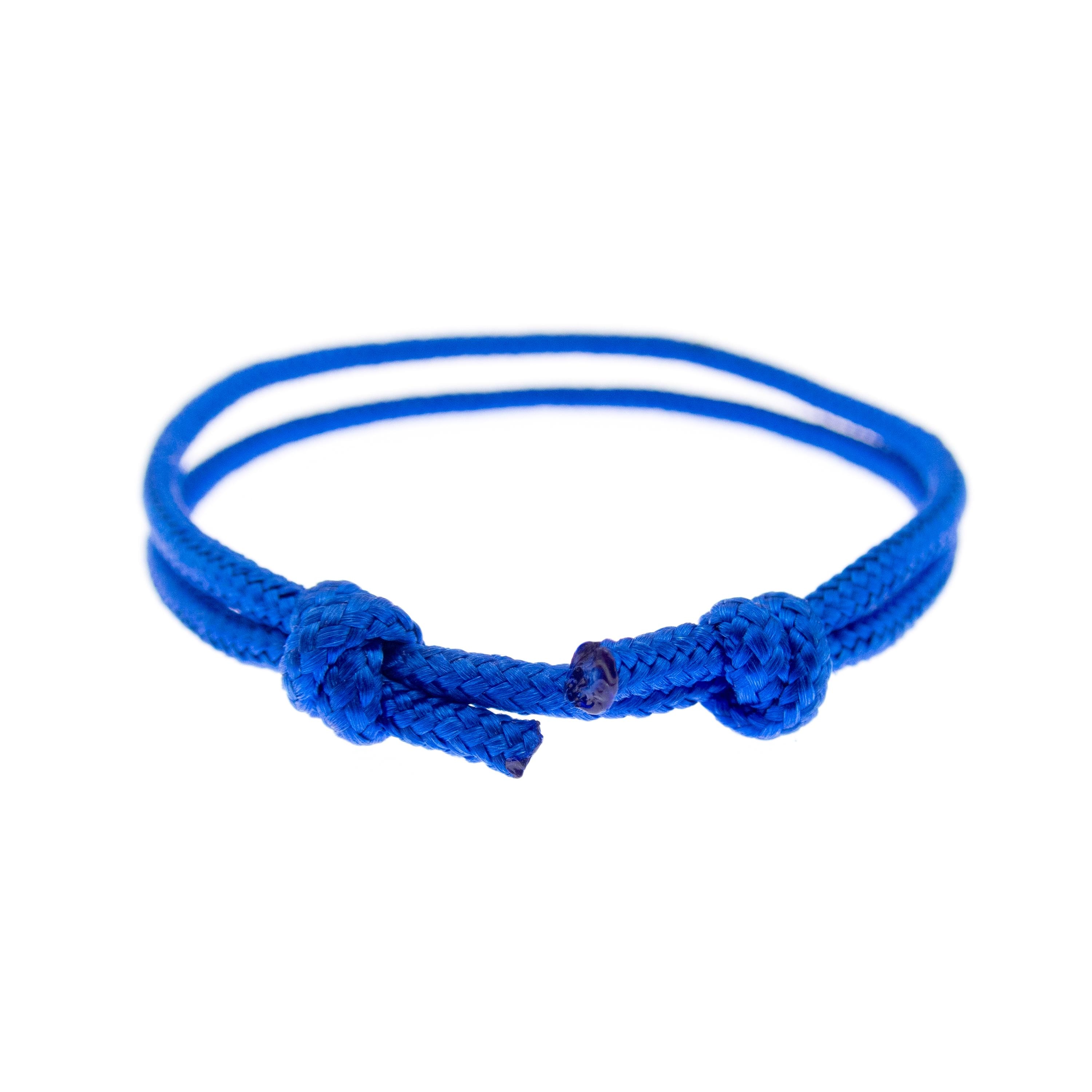 Minimalist blue cord bracelet by Nadamlada featuring adjustable wrap design, perfect as friendship jewelry, surfer accessory and climbing inspired gift.