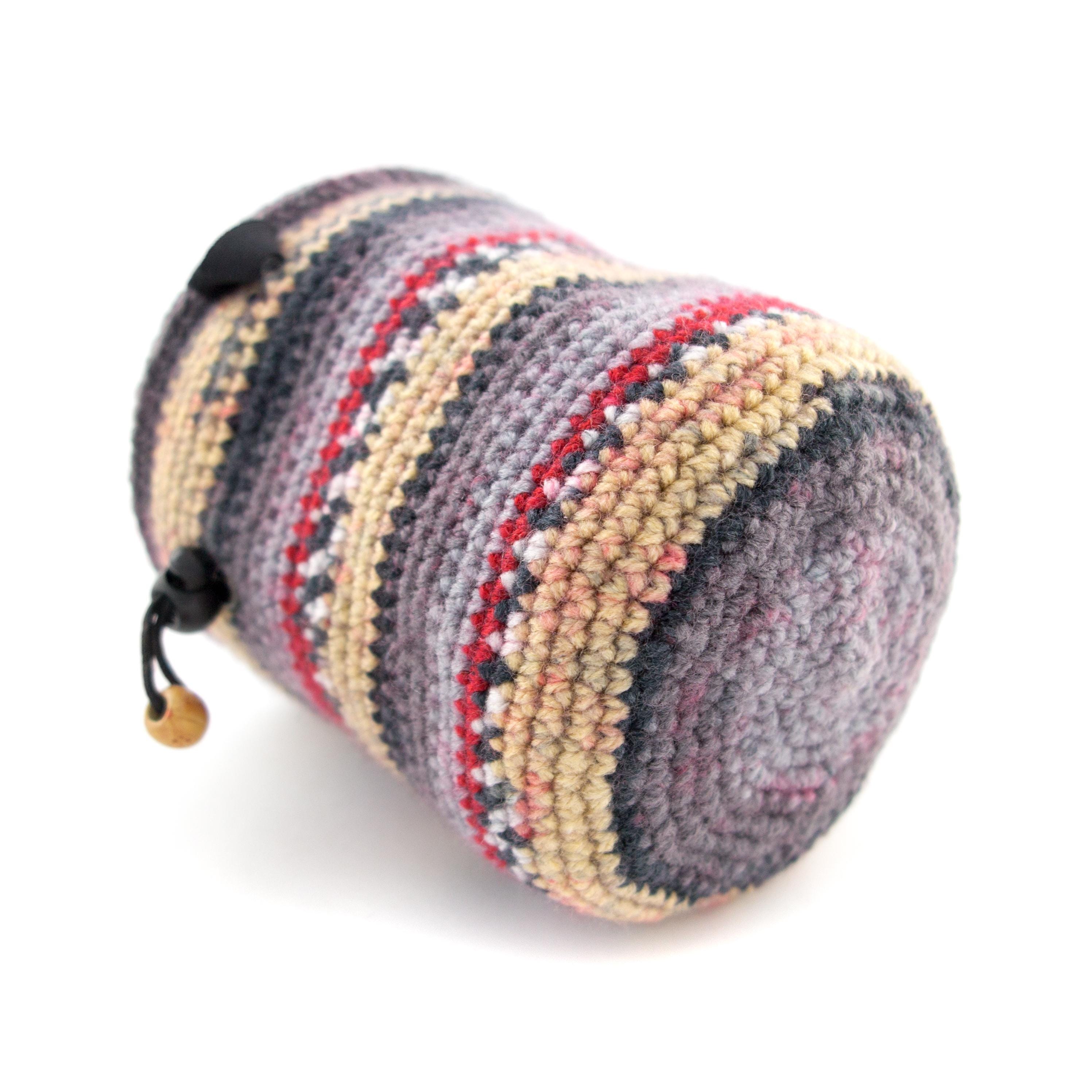 rock climbing chalk bag in a modern striped design, highlighting durable handmade construction and functional open-top structure.