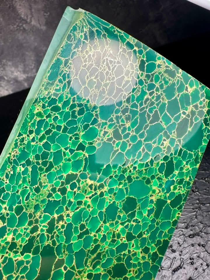 “Emerald green faux malachite composite slab by Mohit Impacts, cellular gemstone texture ideal for handles, pendants and artistic décor.”