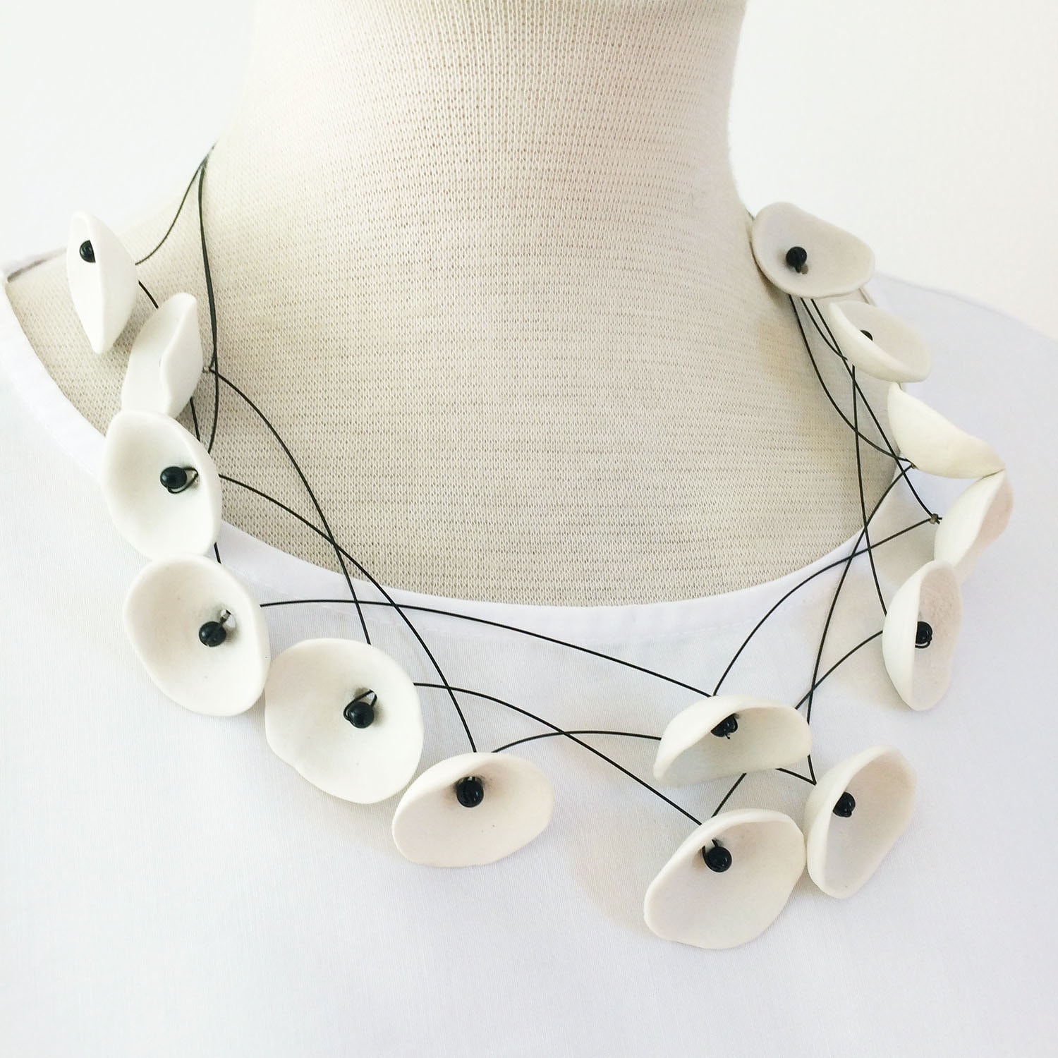 Porcelain nests necklace.