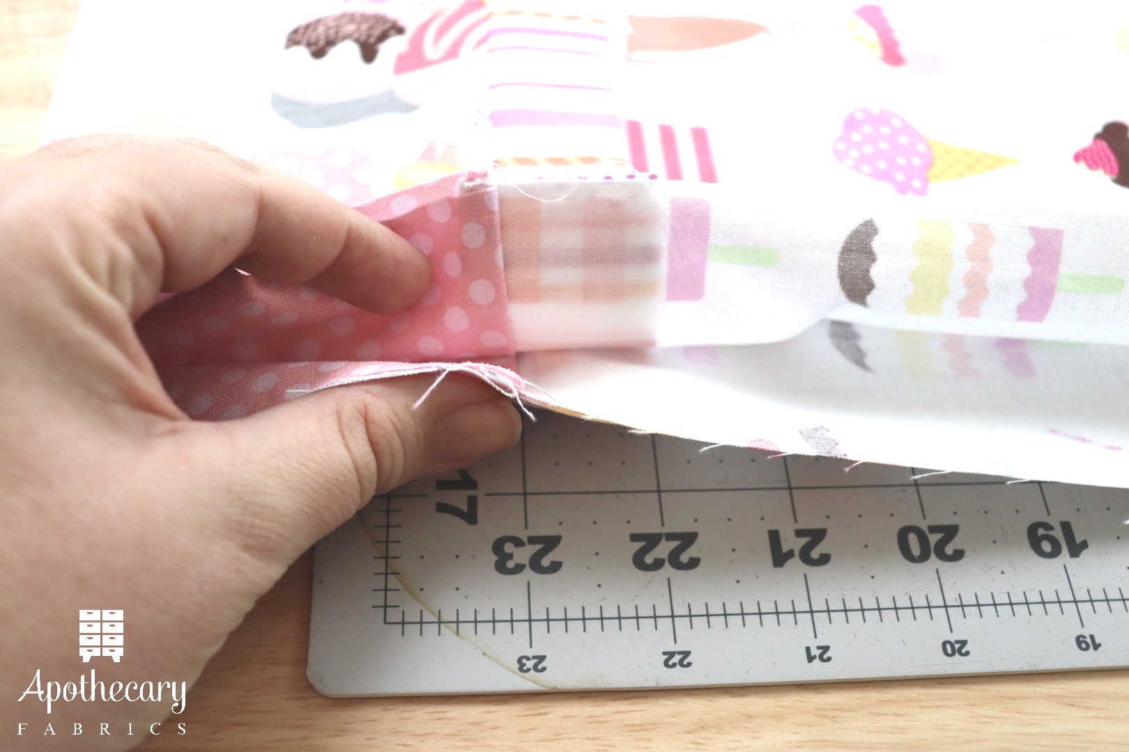 Fabric brought together with the wrong sides facing, the raw edges lined up.