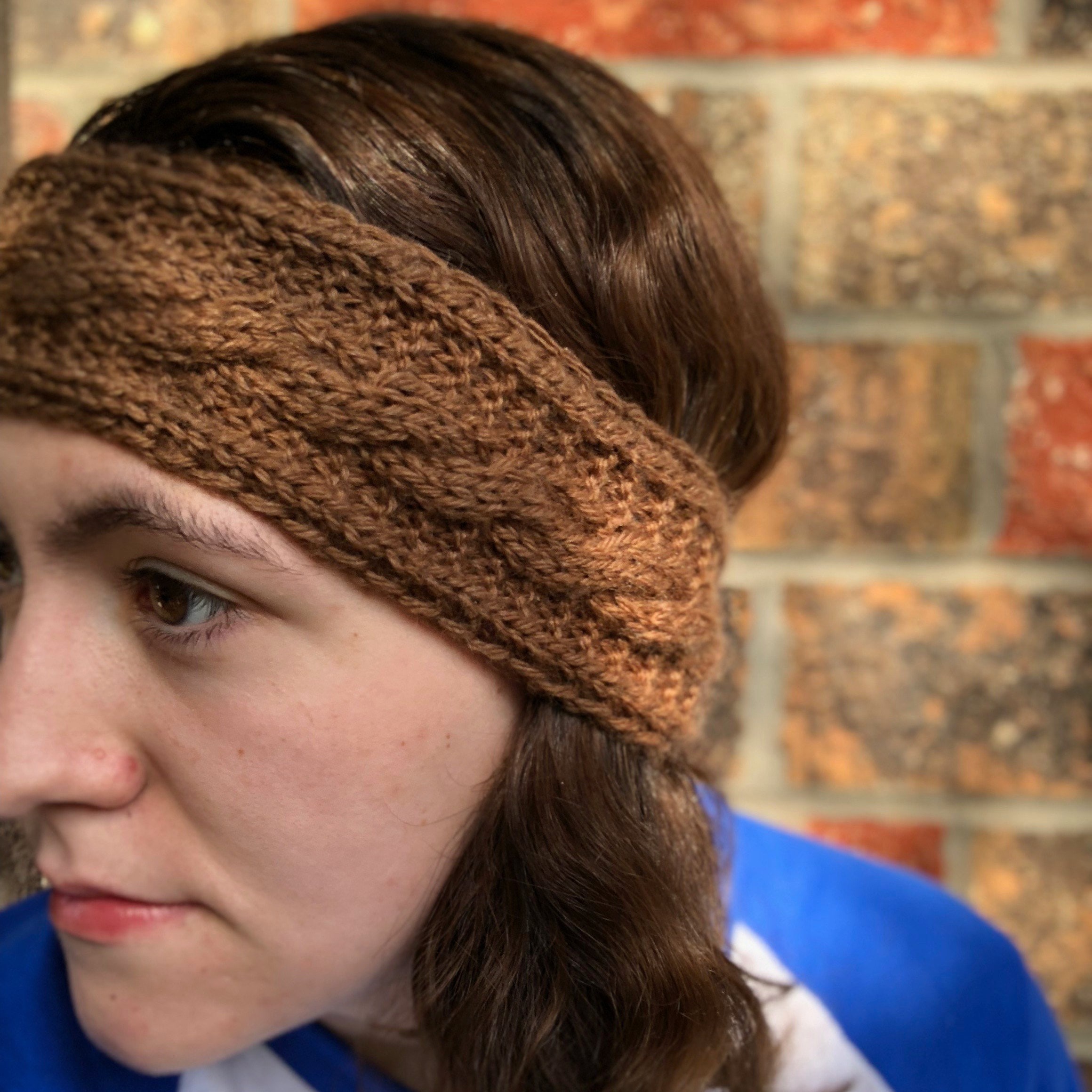 Woman wearing knitted headband