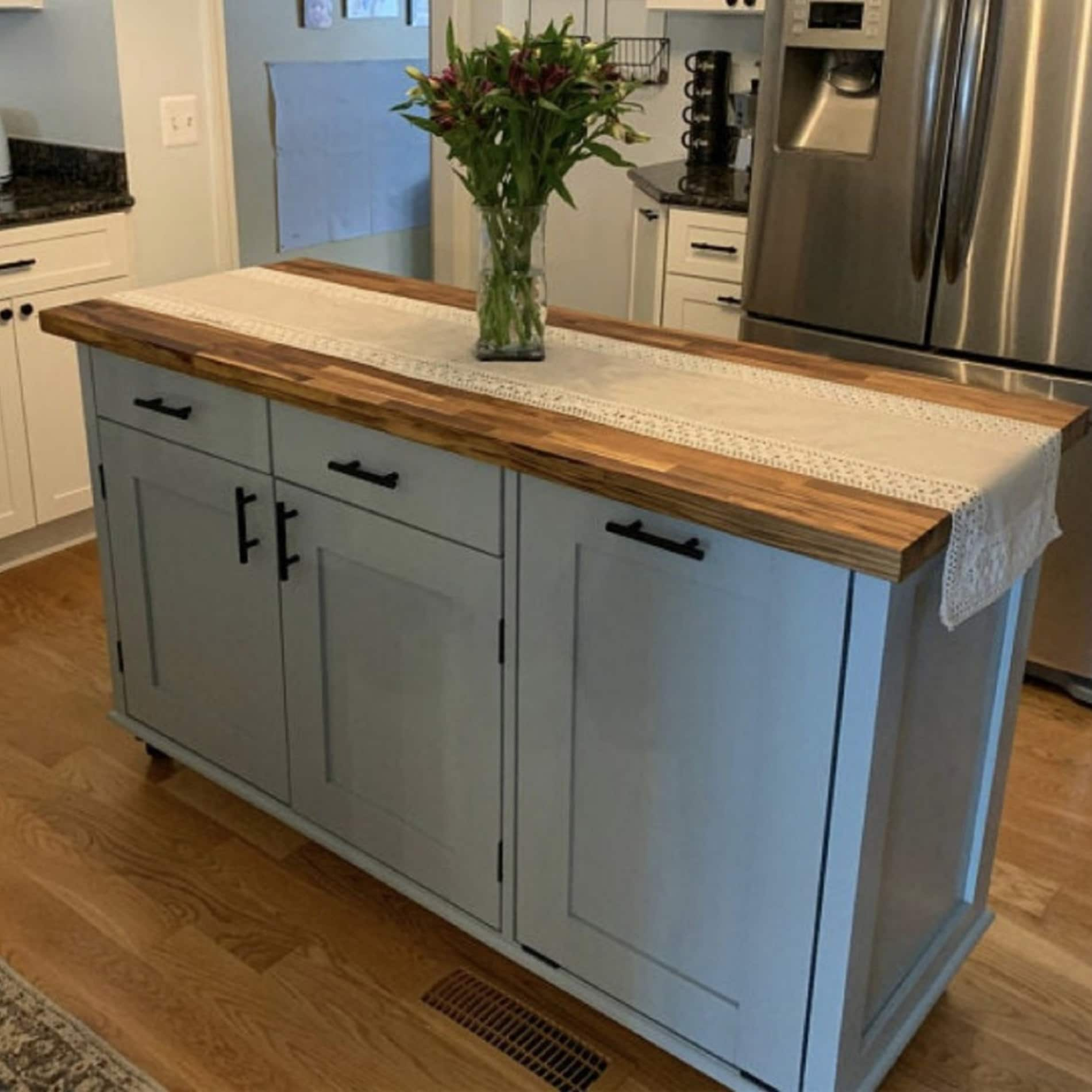 Behling Solid Butcher Block Kitchen Island with Baskets and Storage Shelf