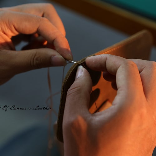 DMleatherStudio store logo