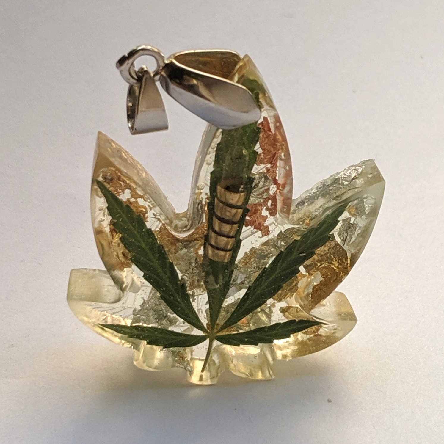 Humboldt county OG kush strain Cannabis and silver leaf rings and Wedding sets