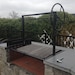 The Ash Argentine Grill with Side Brasero plus cart for wood The Ash is an Argentine Grill with Side Brasero and Wheel