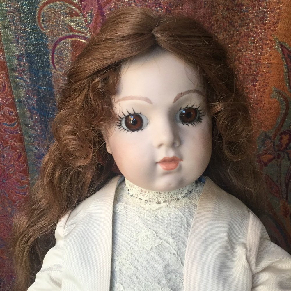 Antique Porcelain Bisque Doll Made in Japan Blue Eyes Soft Body
