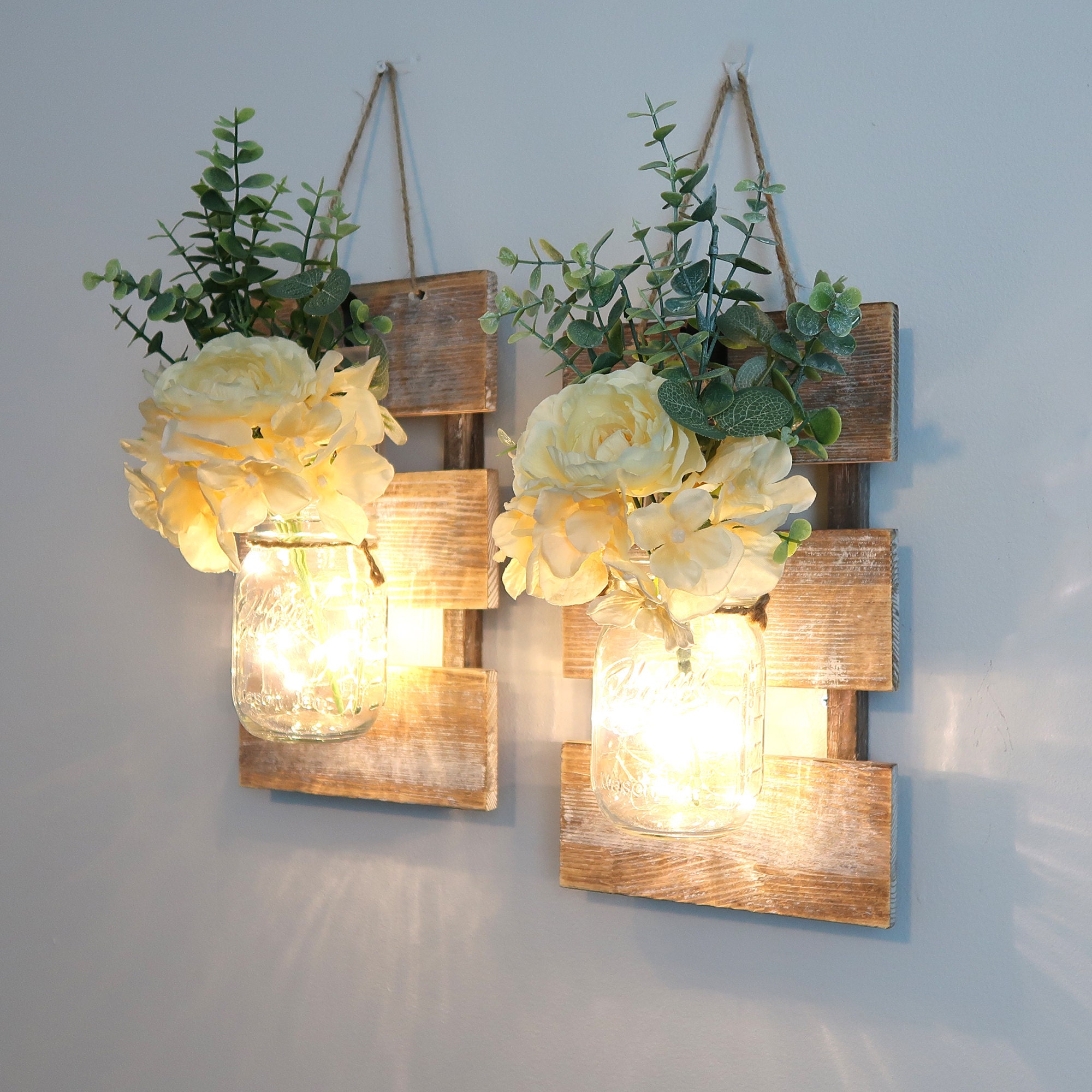 2 Pack Mason Jar Wall Decor With 8 Functions Remote Rustic Wood Farmhous Wall Sconce With White Silk Hydrangea for Home Hanging Mason Jars Light with 6-Hour Timer 30 Led Fairy Lights