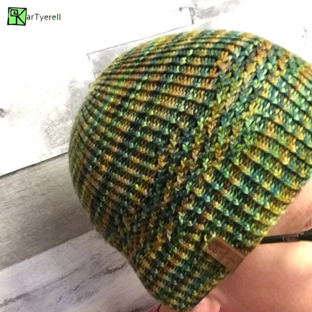 Luxury hand knit accessories for the whole family. by arTyerell