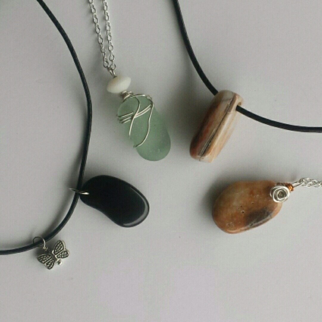 Polished Black with Brown Speckles with White Quartz Streak Oblong Beach Stone Sea Stone Wire Wrapped Pendant Opera Length Necklace