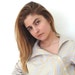 Lucia A.