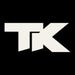 T K