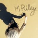 M. Riley